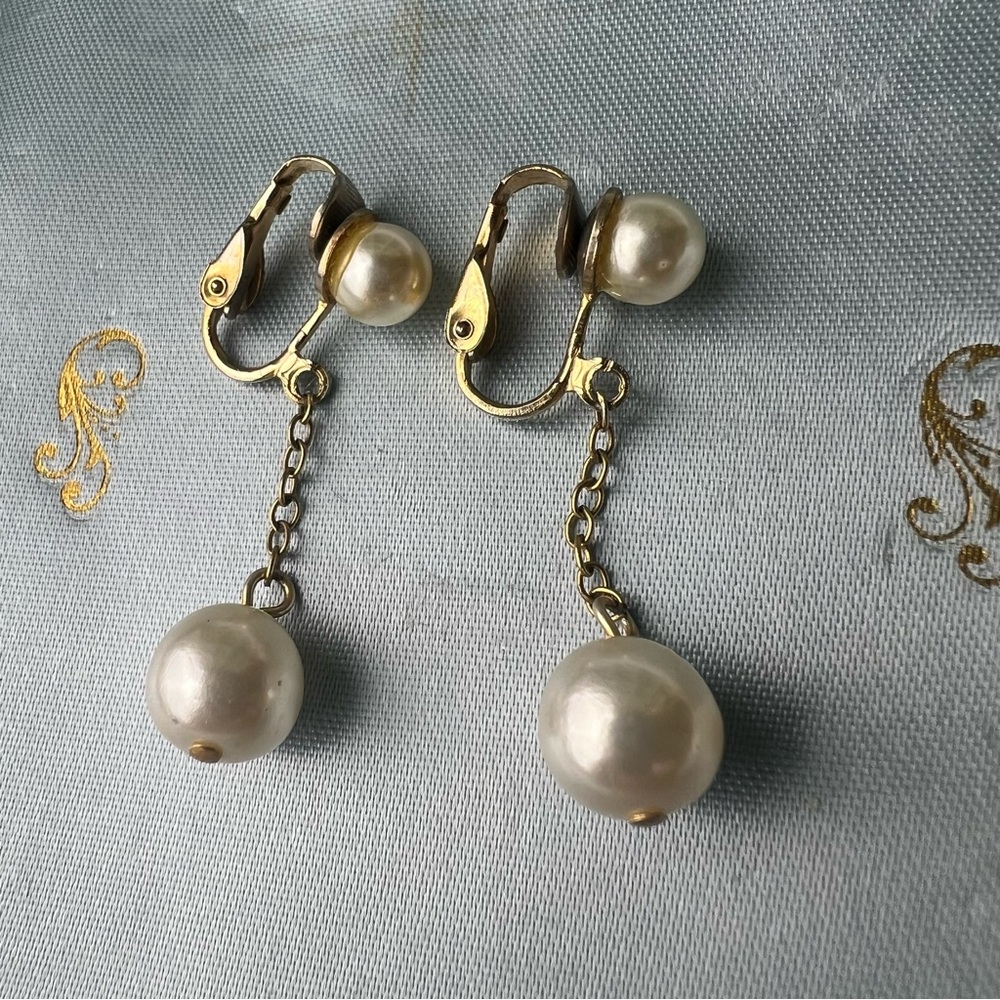Elegant Gold and Cream Dangle Earrings